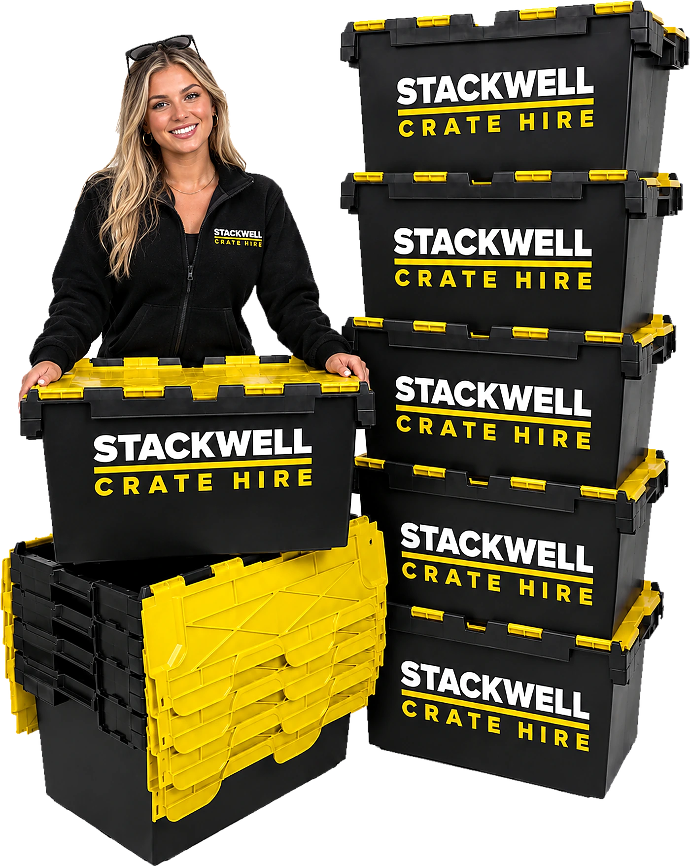 Stacks of black Stackwell crates with yellow lids, with a member of the Stackwell team